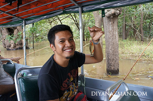 azman and first piranha catch during piranha fishing at amazon river