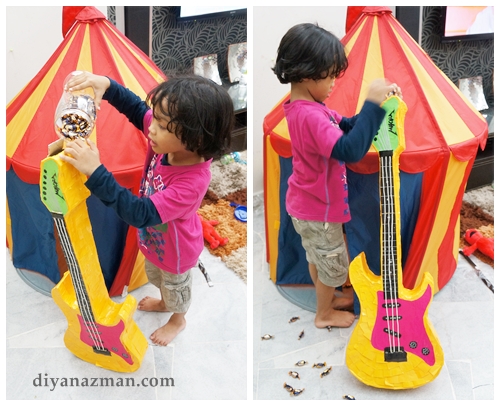 filling in candy inside the pinata