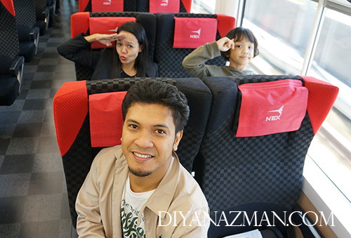 Family selfie inside NEX train